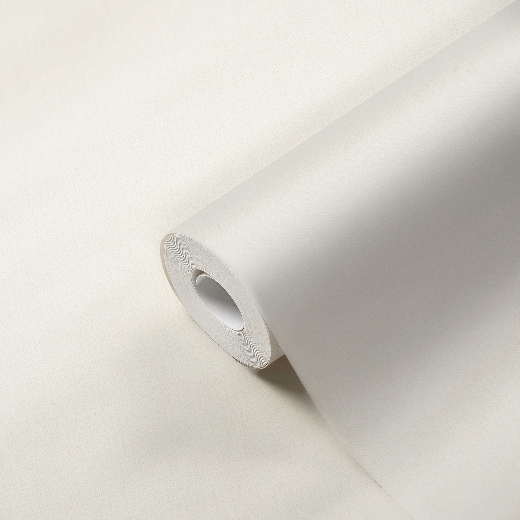             Textiel look vliesbehang wit mat met stofstructuur
        