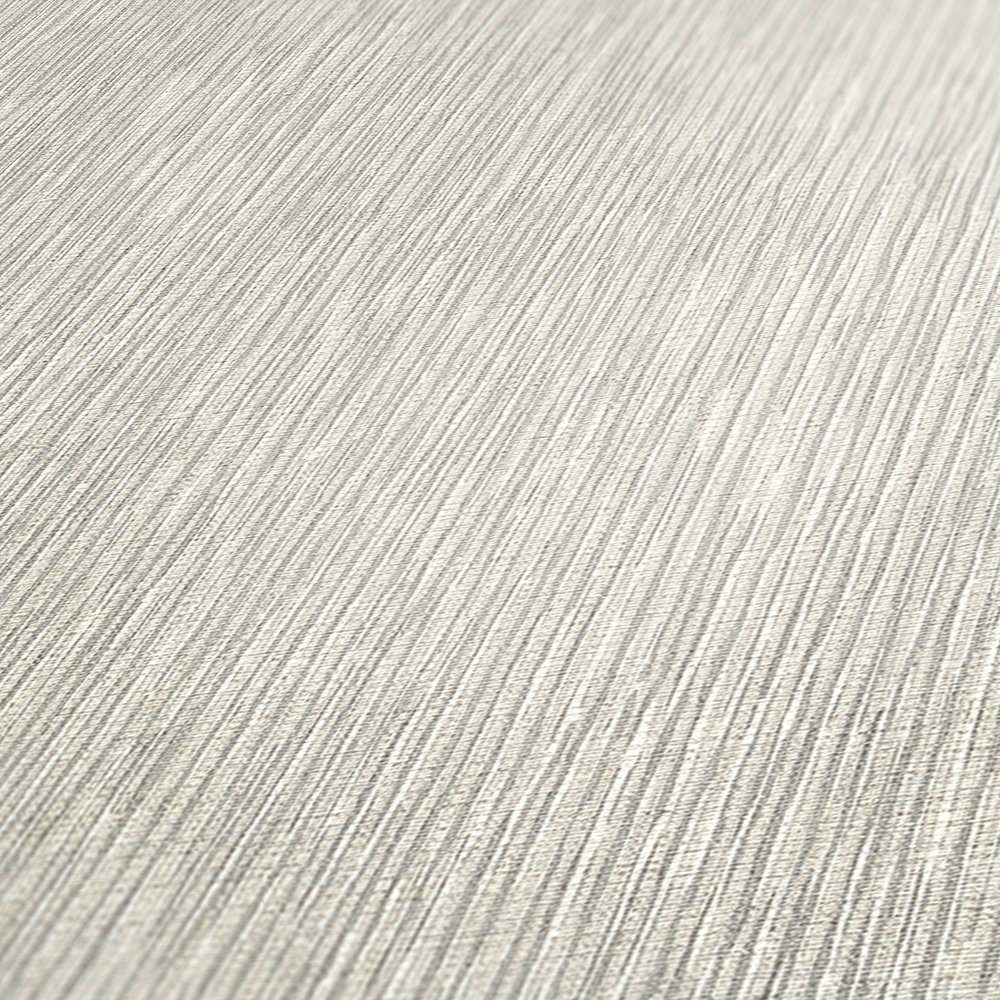             Grey wallpaper with metallic lines & texture embossing
        