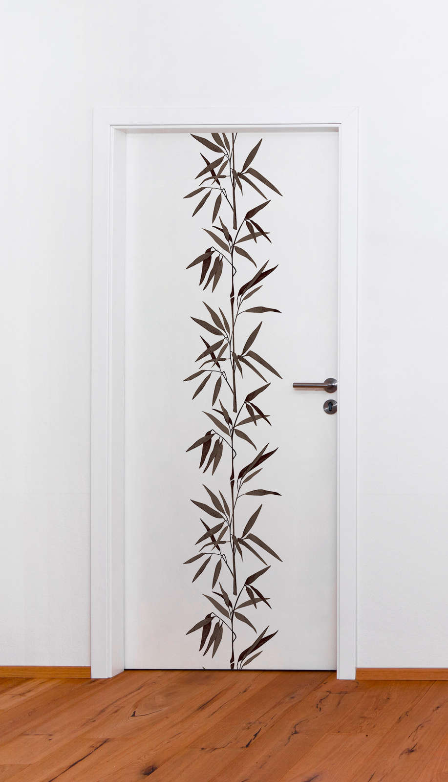             Black and white non-woven wallpaper with bamboo motif
        