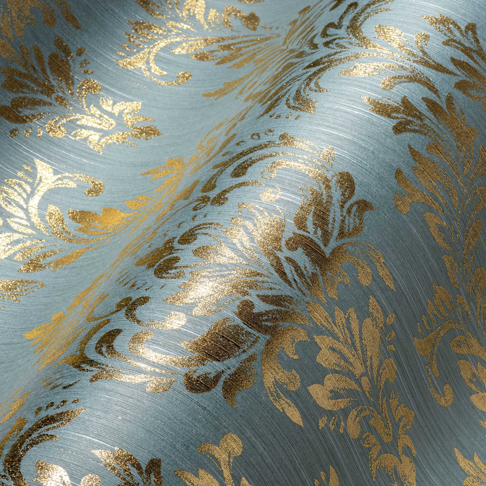             Ornamenteel behang met gouden glittereffect - goud, blauw, groen
        