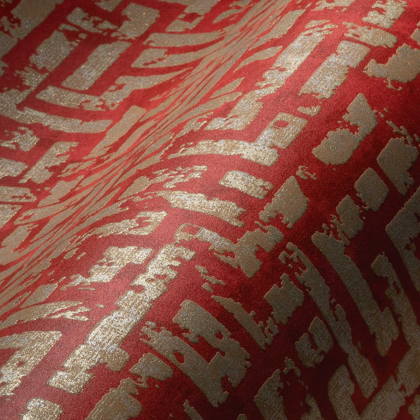             Papier peint rouge-or avec motif graphique & aspect usé - rouge, métallique
        
