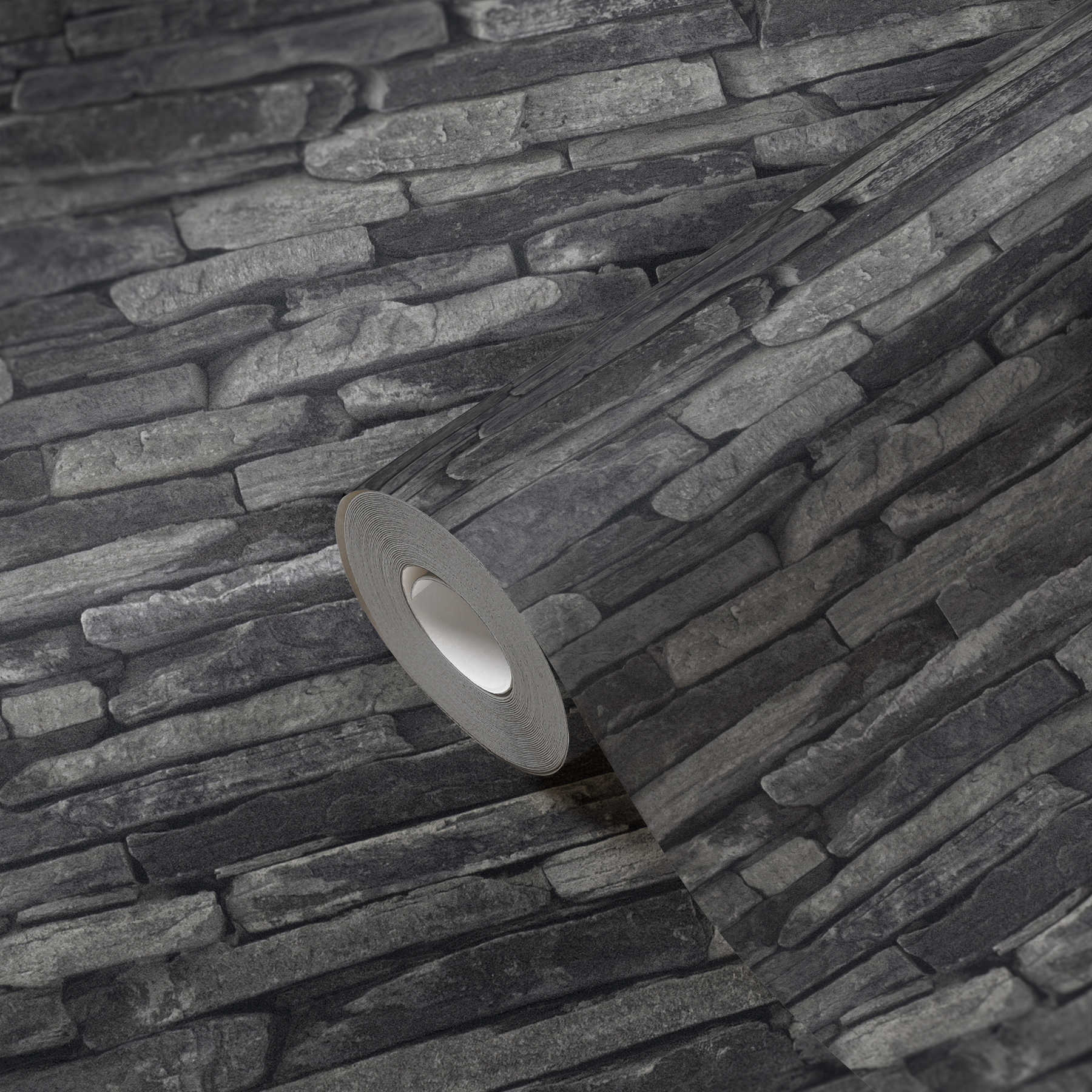             Wallpaper with stone look, dark natural stones & 3D effect - grey, black
        