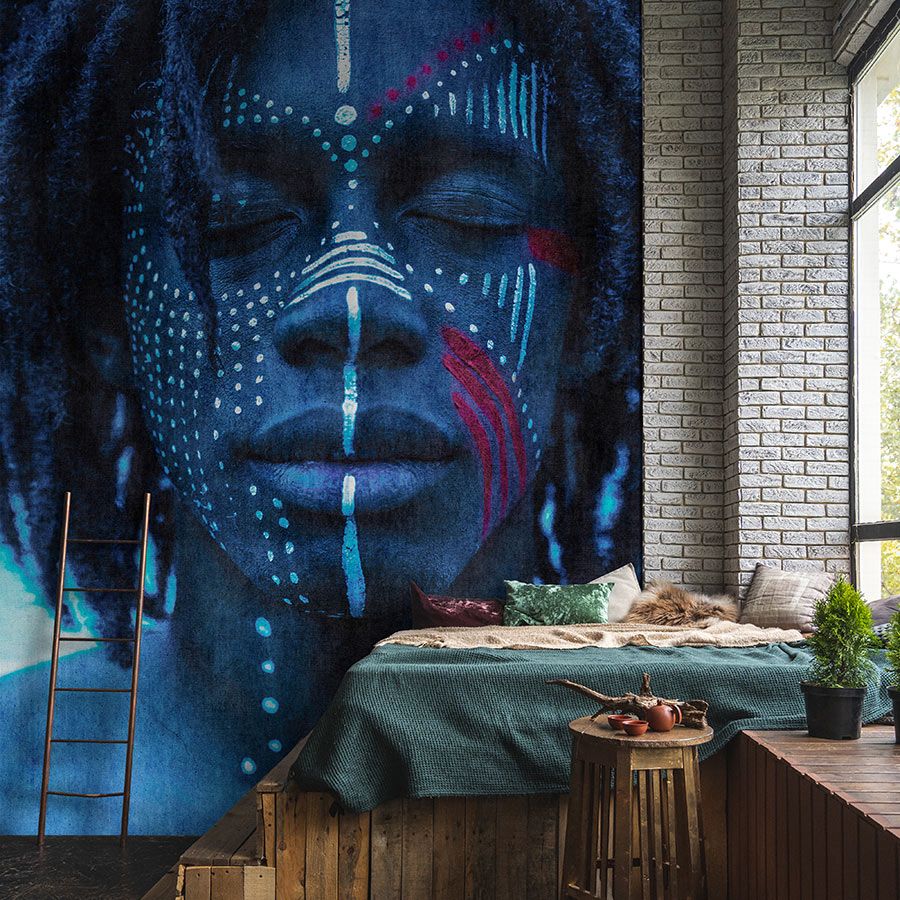 Photo wallpaper »mikala« - African portrait blue with tapestry structure - Lightly textured non-woven fabric
