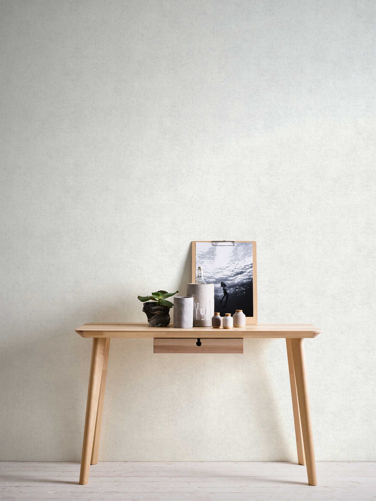             Grey and white non-woven wallpaper with rustic texture design & matte gloss effect
        