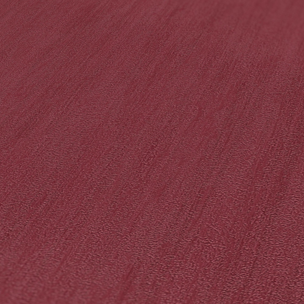            wallpaper wine red plain mottled with plaster look structure embossing
        