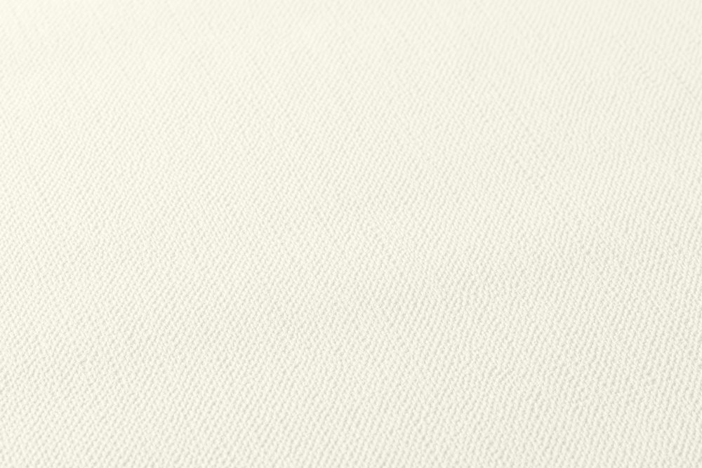             Papier peint uni crème avec structure en mousse d'aspect textile
        