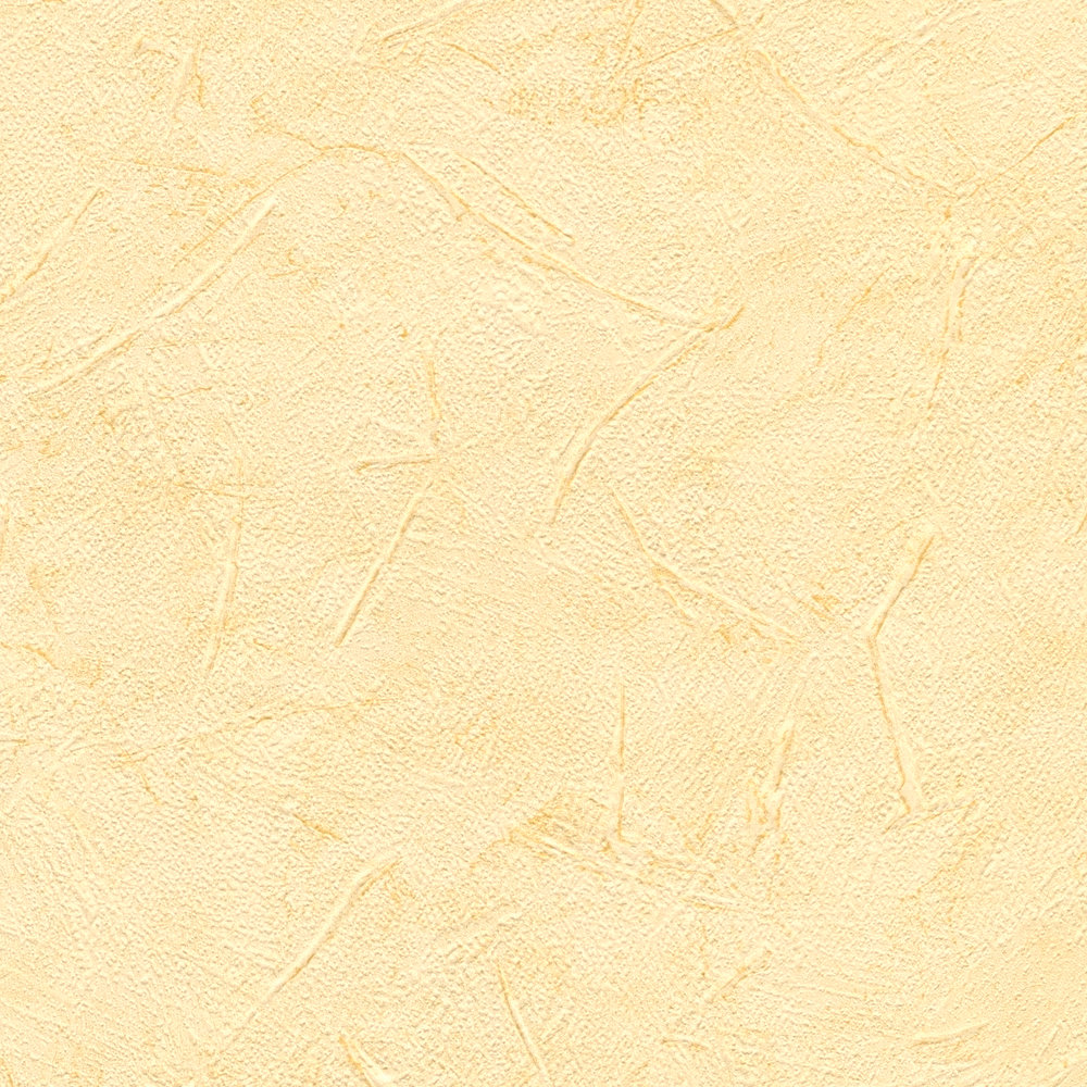             Papel pintado amarillo con aspecto de yeso moteado
        