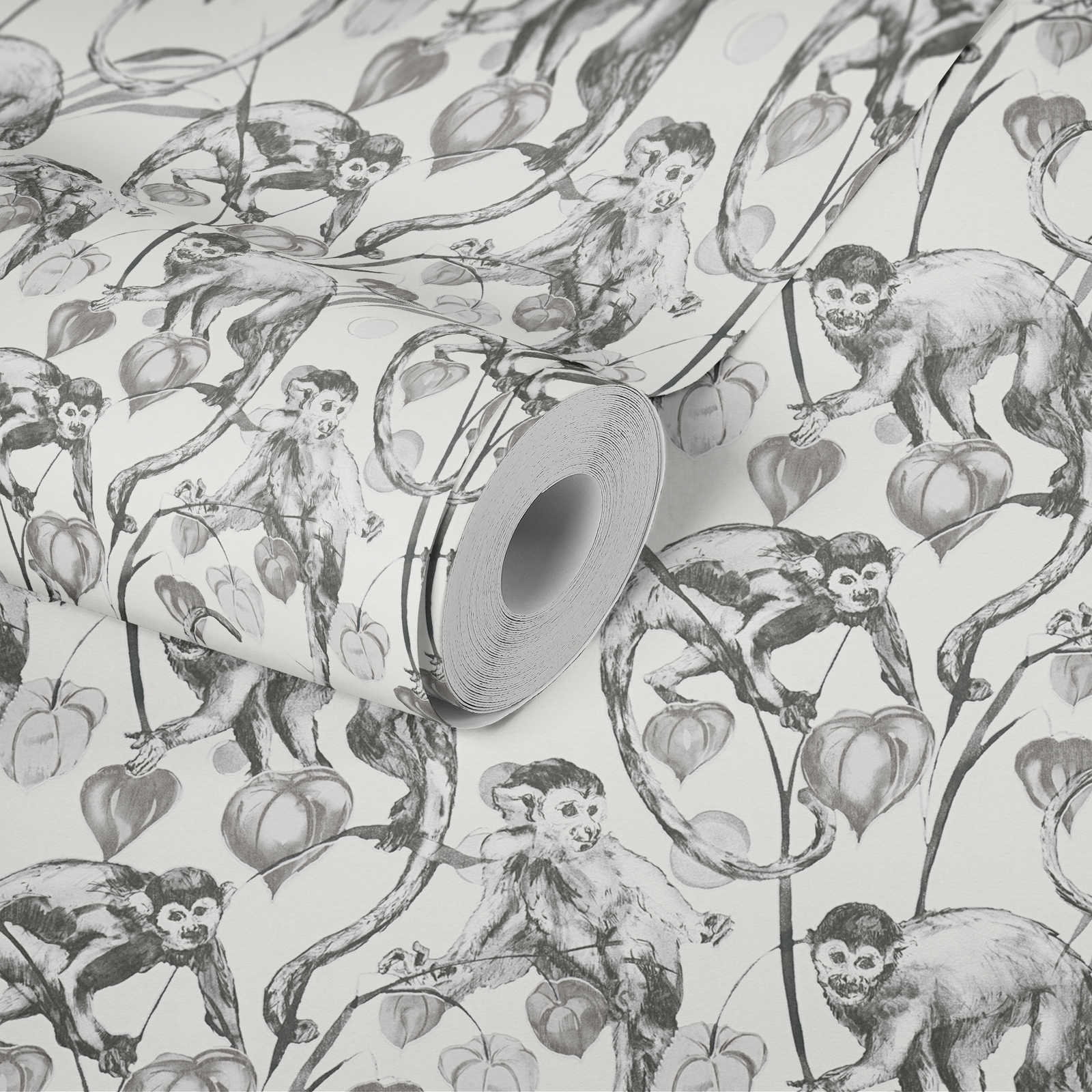             Papel pintado no tejido MICHALSKY con motivos de monos en blanco y negro
        