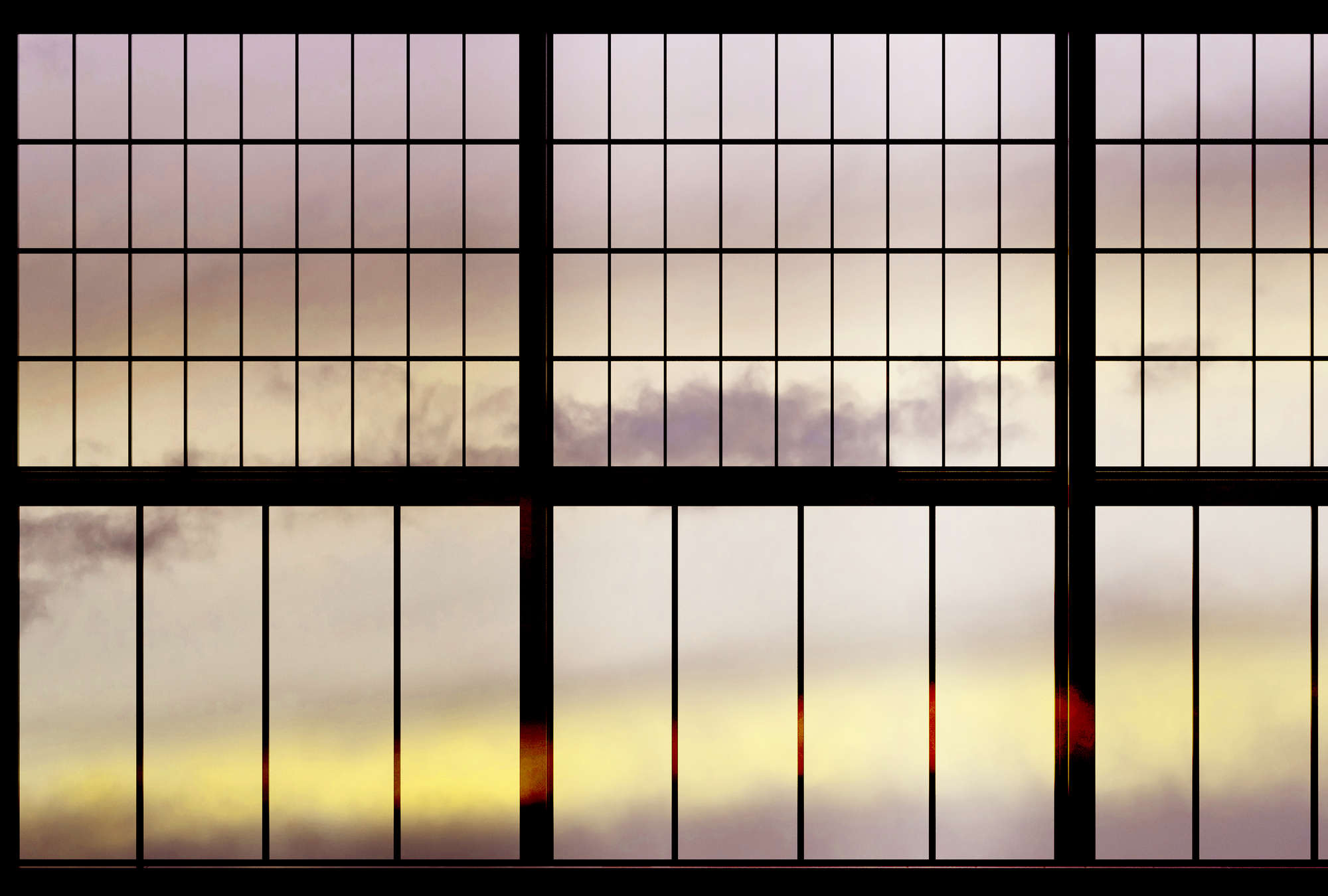             Sky 2 - papier peint fenêtre vue lever de soleil - jaune, noir | intissé lisse mat
        