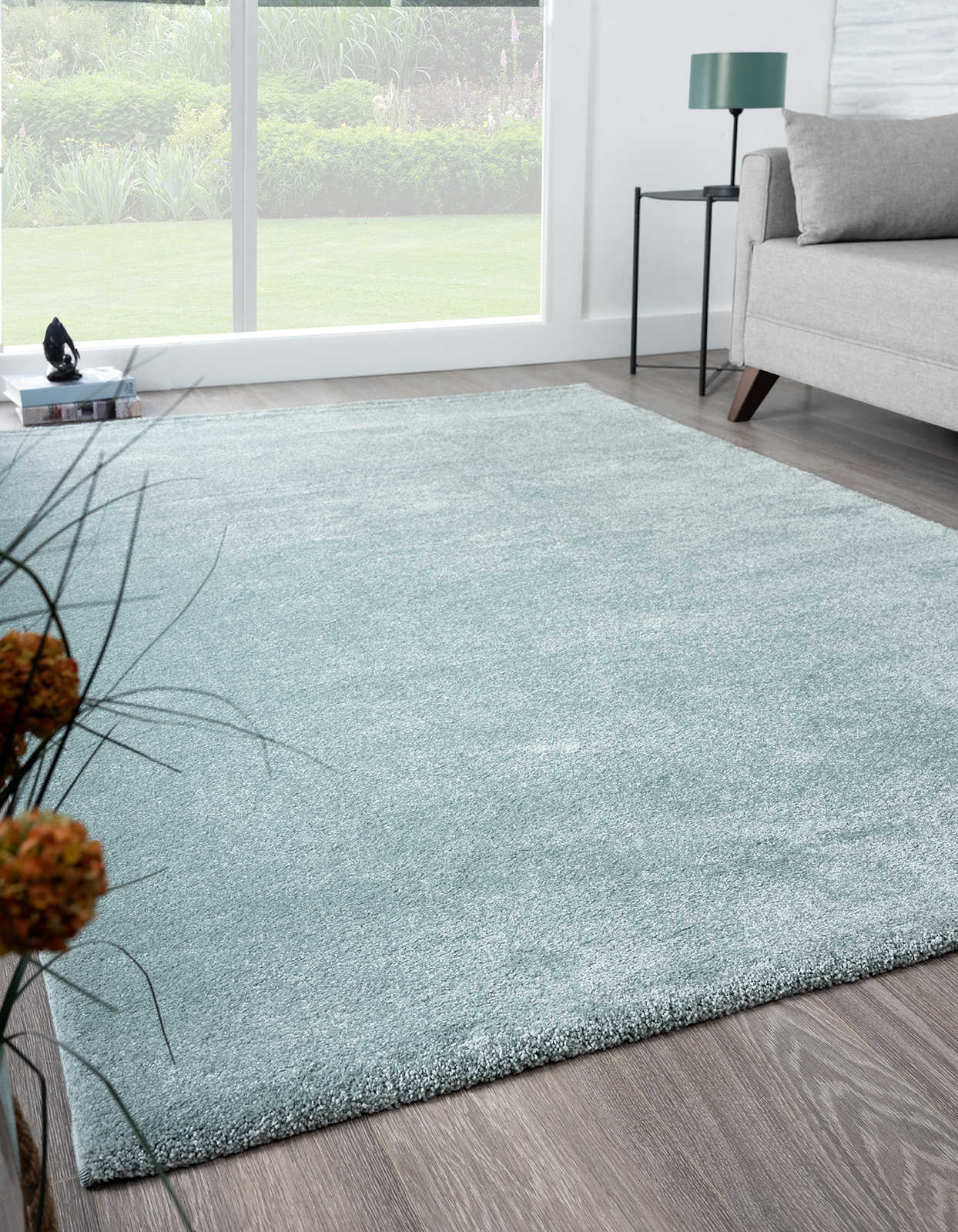 Simple short pile carpet in blue - 110 x 60 cm
