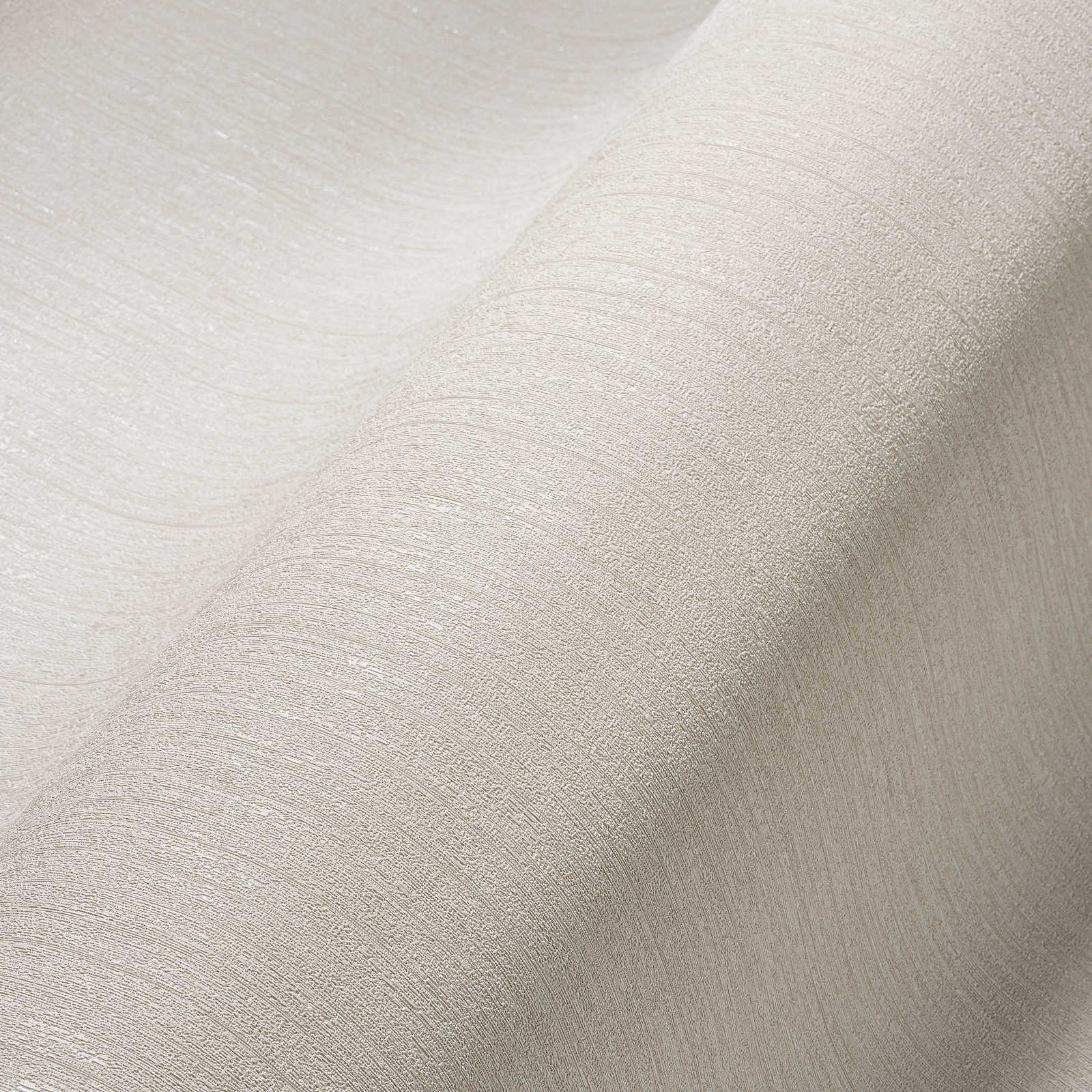             Non-woven wallpaper taupe, plain & satin with texture effect
        