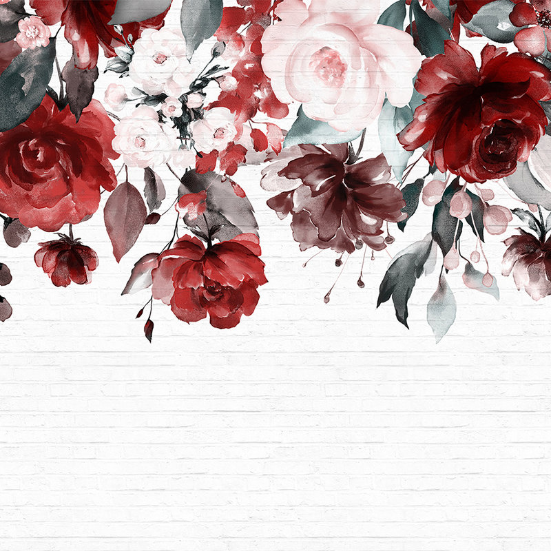 Fleurs éclatantes sur mur en aspect pierre - blanc, rouge, rose
