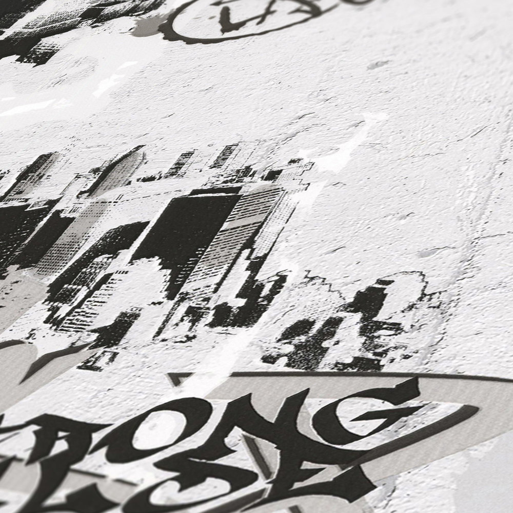             Papel pintado de grafiti con aspecto de hormigón, diseño urbano - negro, blanco
        