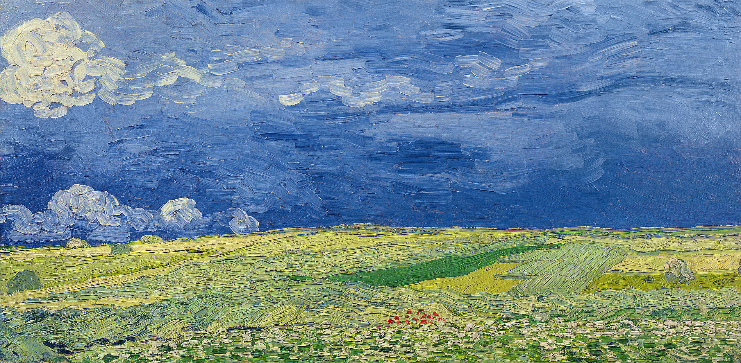             Mural "Campos de trigo bajo nubes de tormenta" de Vincent van Gogh
        