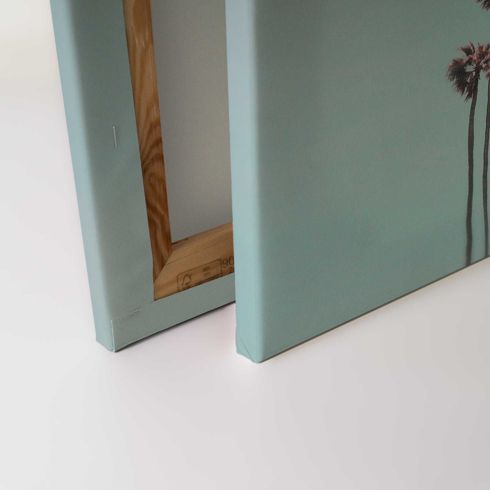             Tableau toile Palmiers & ciel pour une ambiance de plage en turquoise & rose - 0,90 m x 0,60 m
        
