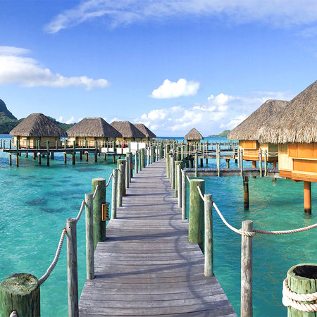 Exotic photo wallpaper Thaiti bungalows in the water
