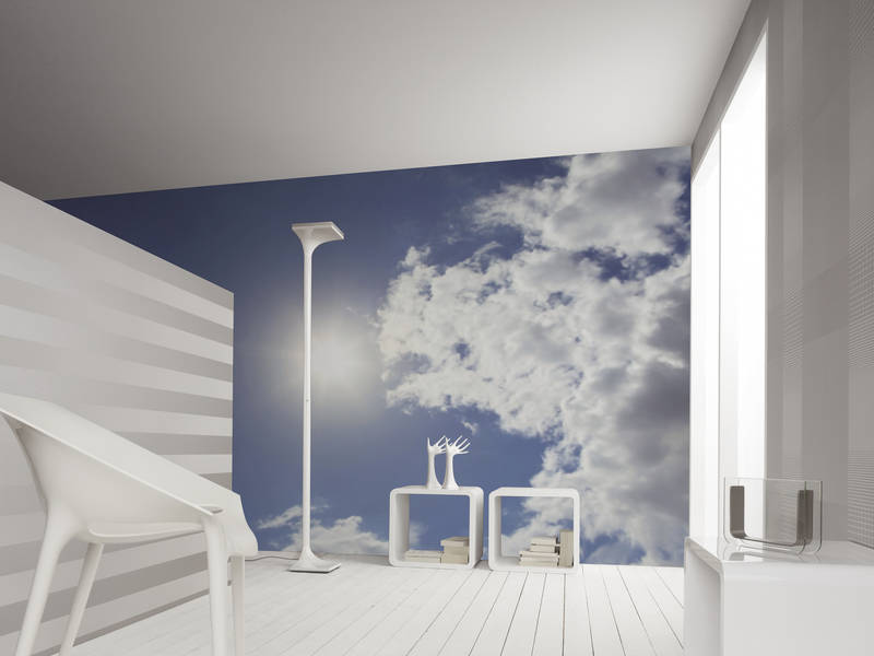             Blauwe lucht - zonneschijn & blauwe wolkenlucht muurschildering
        