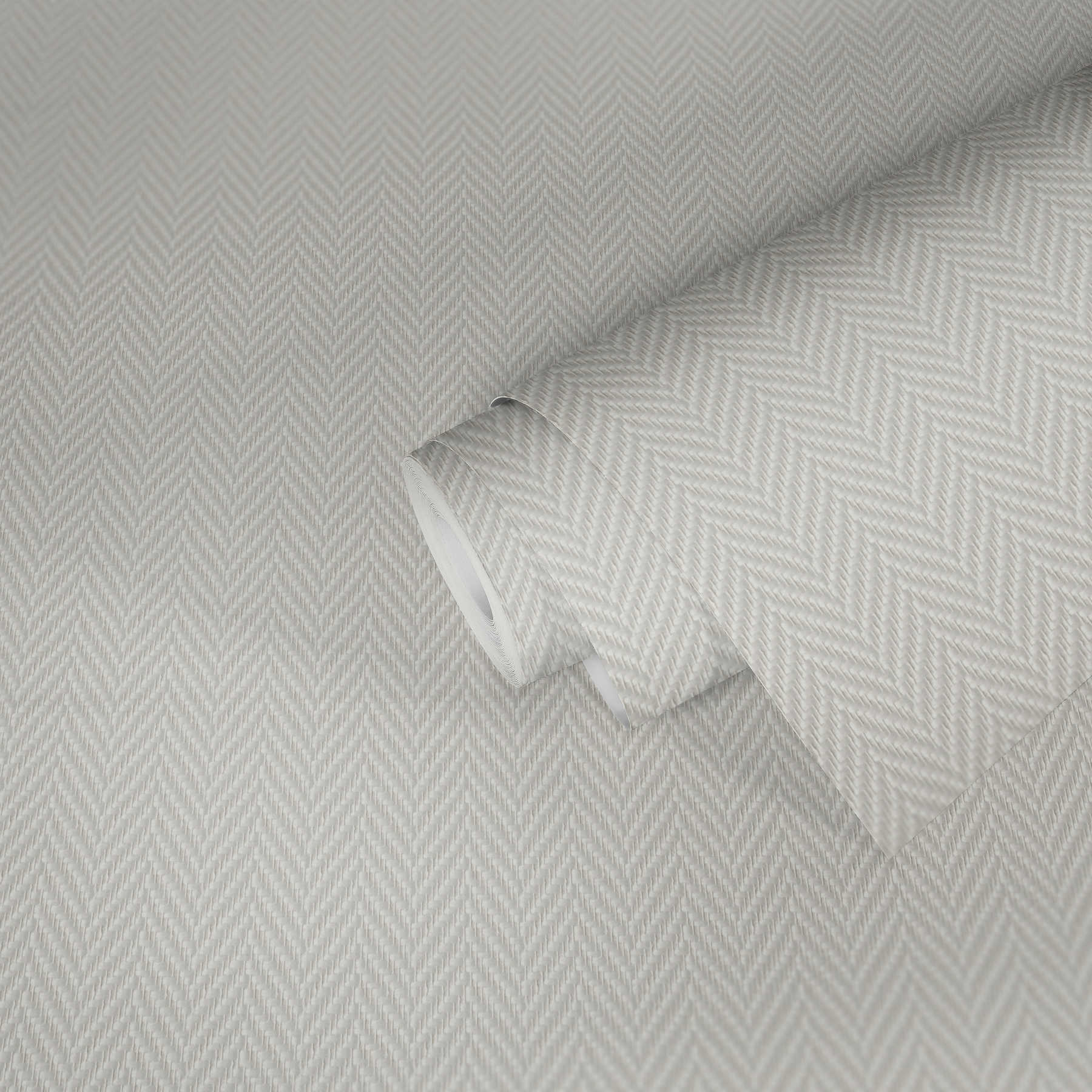             Glass fibre wallpaper with herringbone pattern - dimensionally stable, can be painted over several times
        