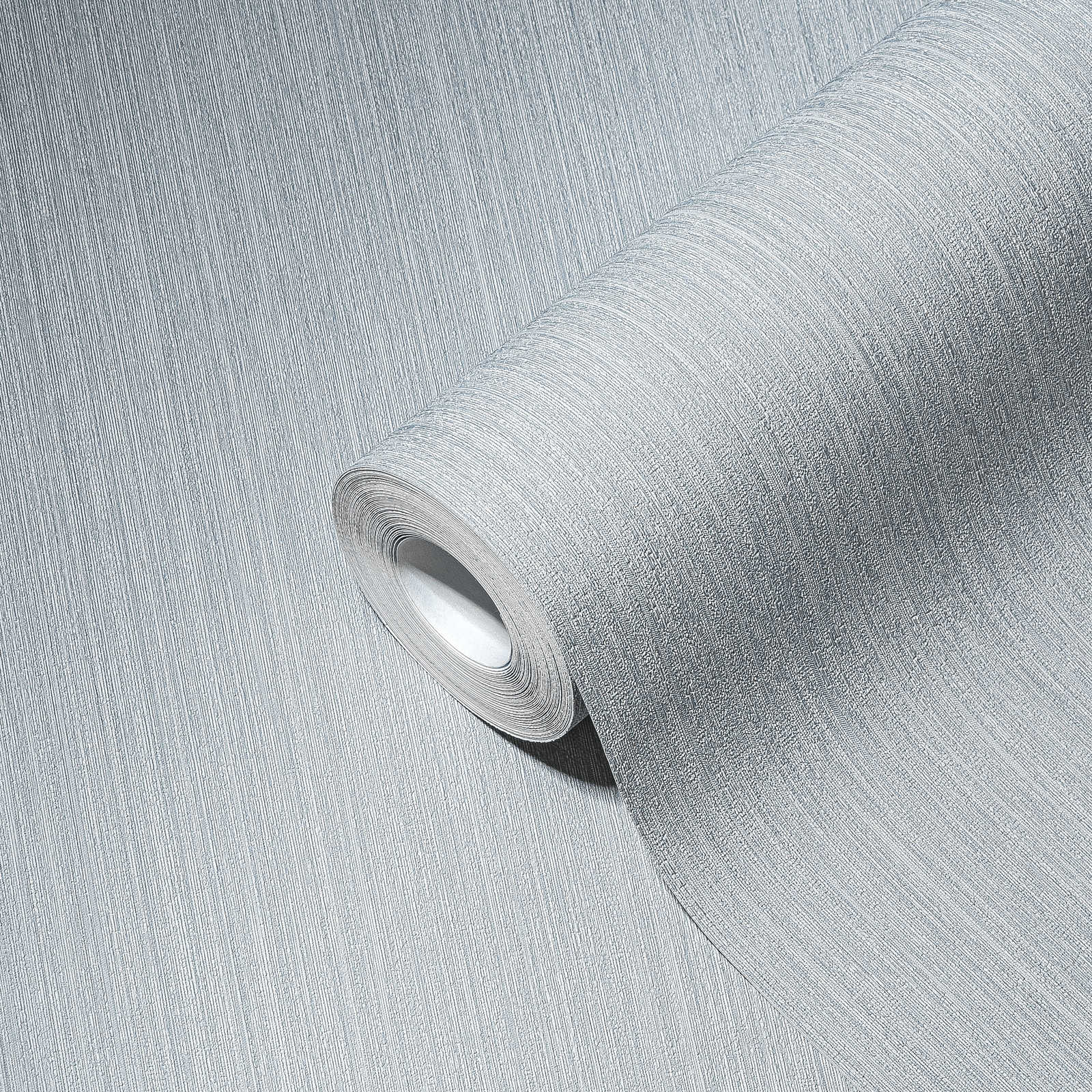             Non-woven wallpaper dove grey satin, plain with texture effect
        
