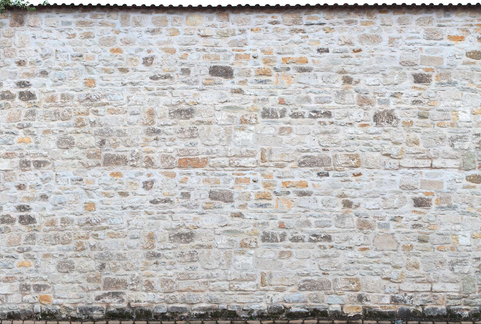             Papier peint panoramique style campagne - mur de pierres naturelles
        
