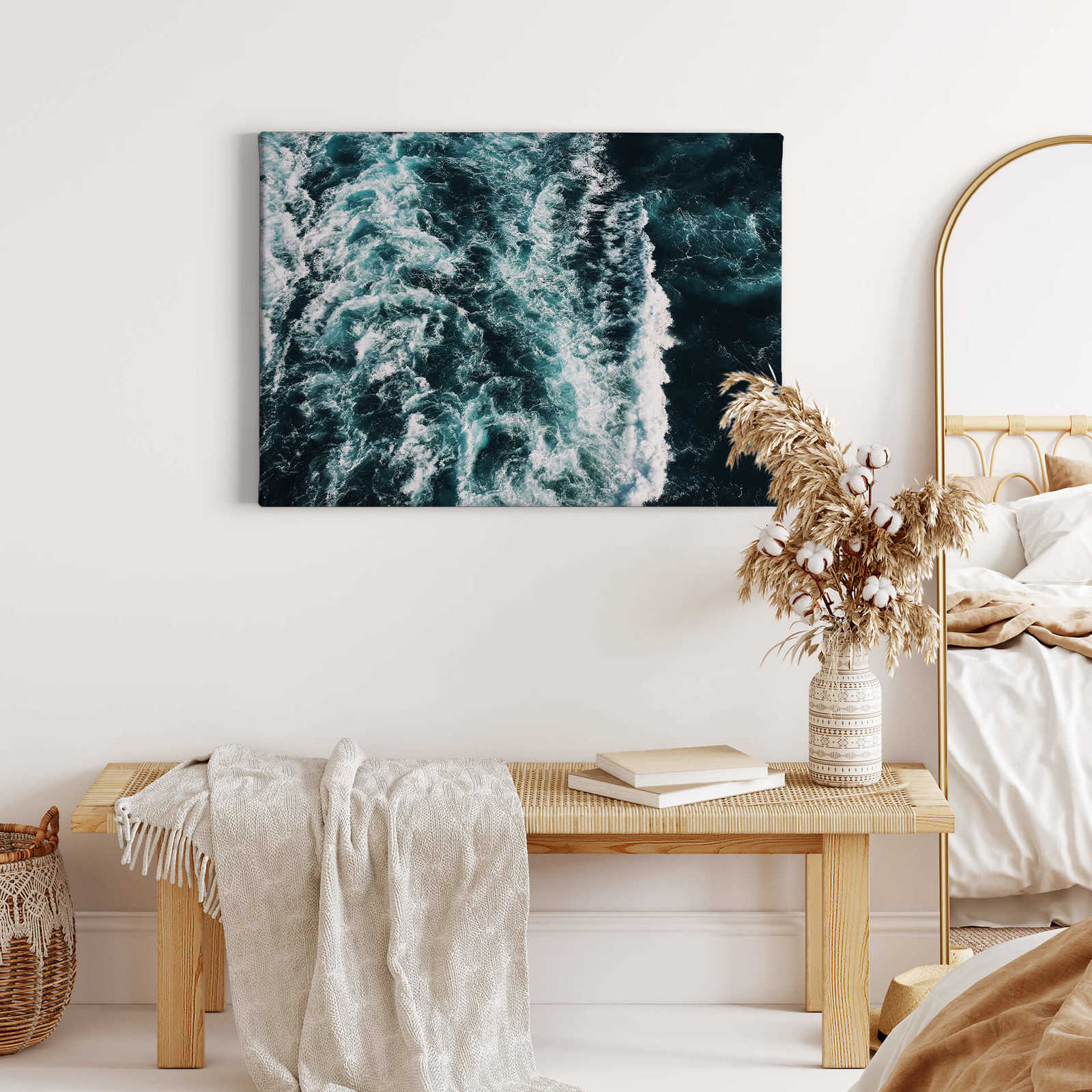             Blue sea canvas print with wave motif
        