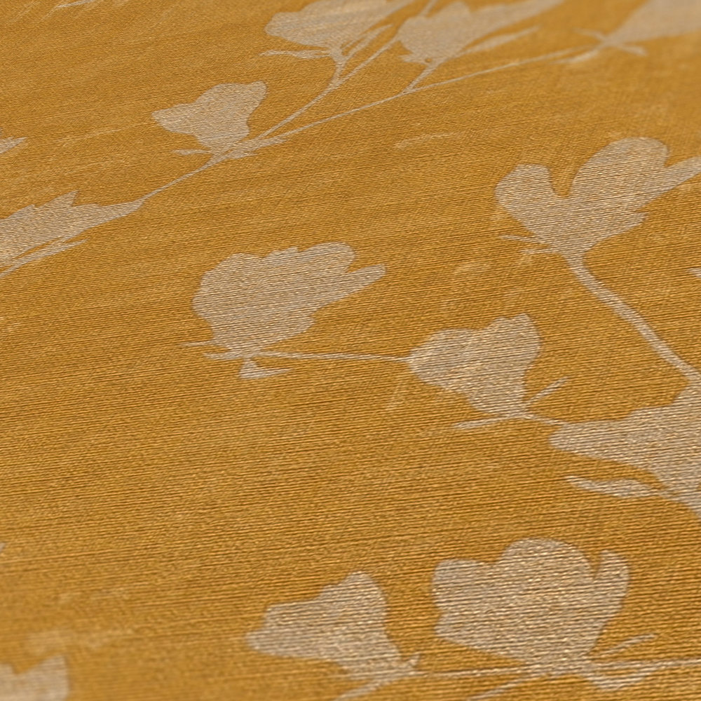            Papier peint intissé uni effet chiné - jaune
        