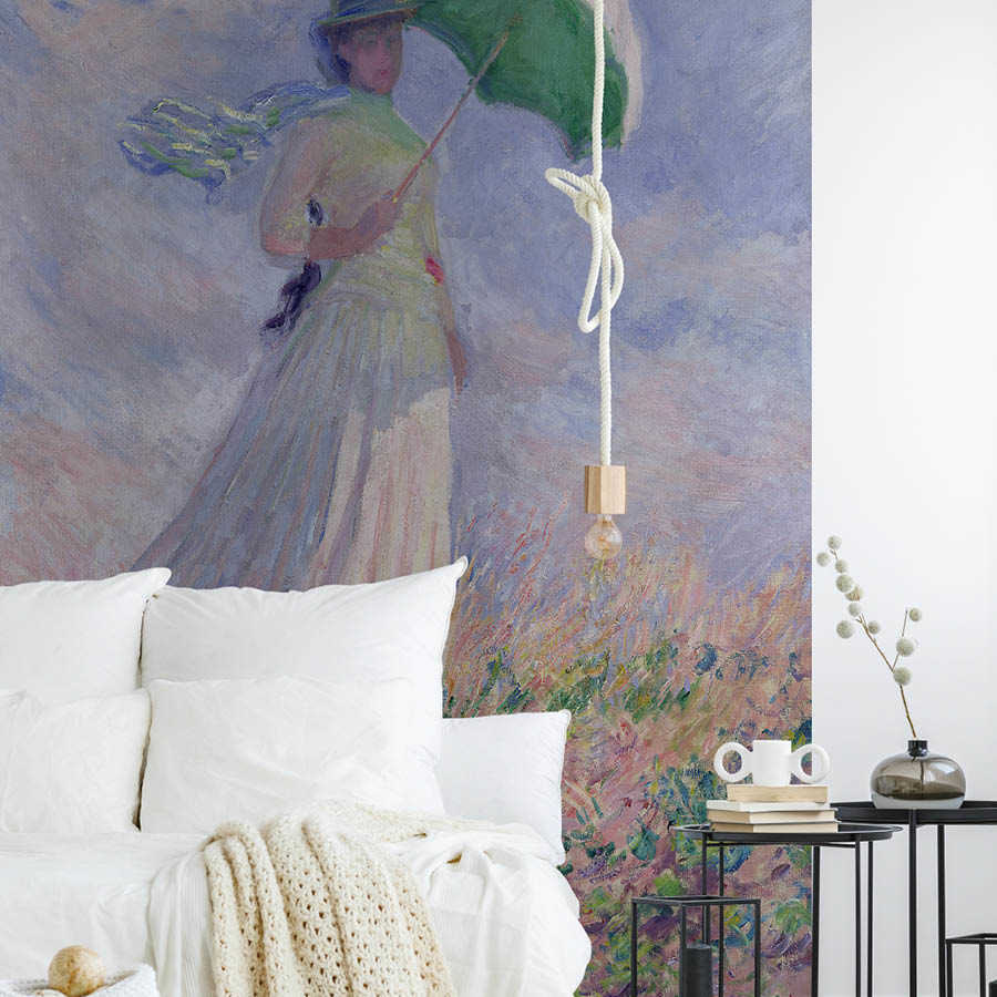 Muurschildering "Vrouw met parasol naar rechts gedraaid" van Claude Monet

