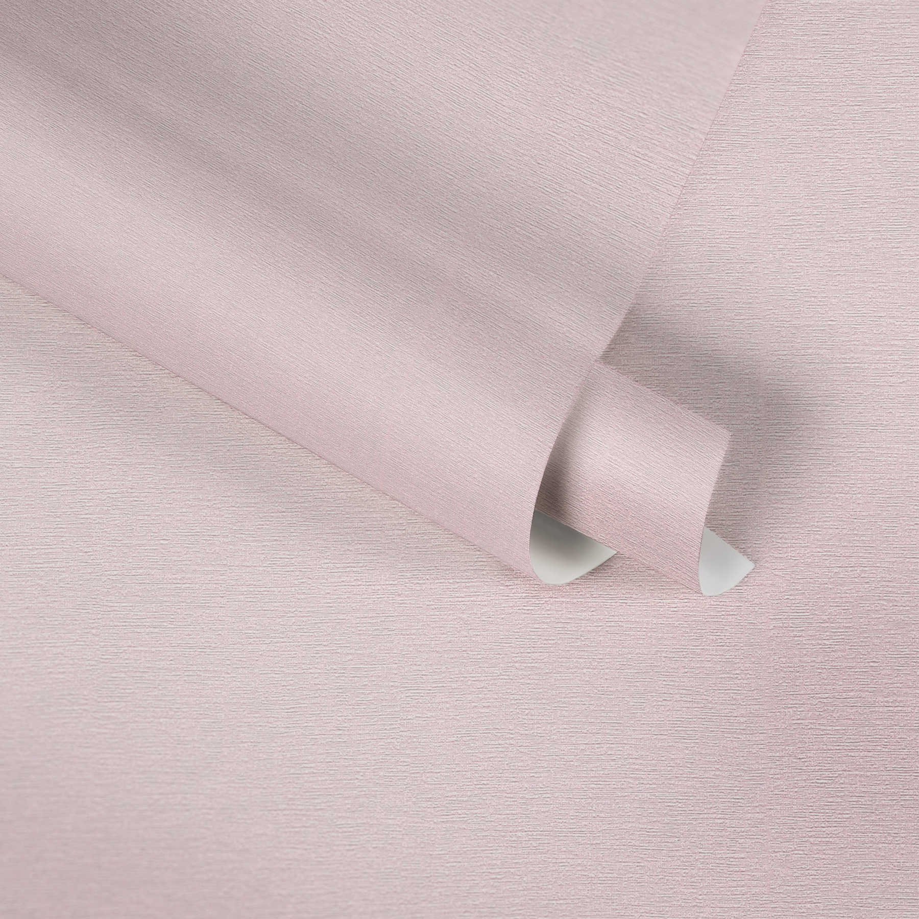             Non-woven wallpaper plain with textile look - pink
        
