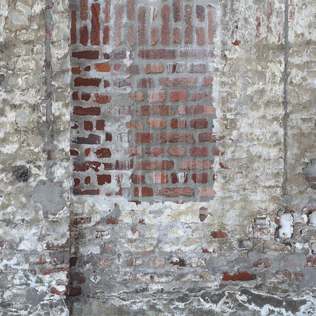 Mural de pared con aspecto de ladrillo y yeso en diseño usado

