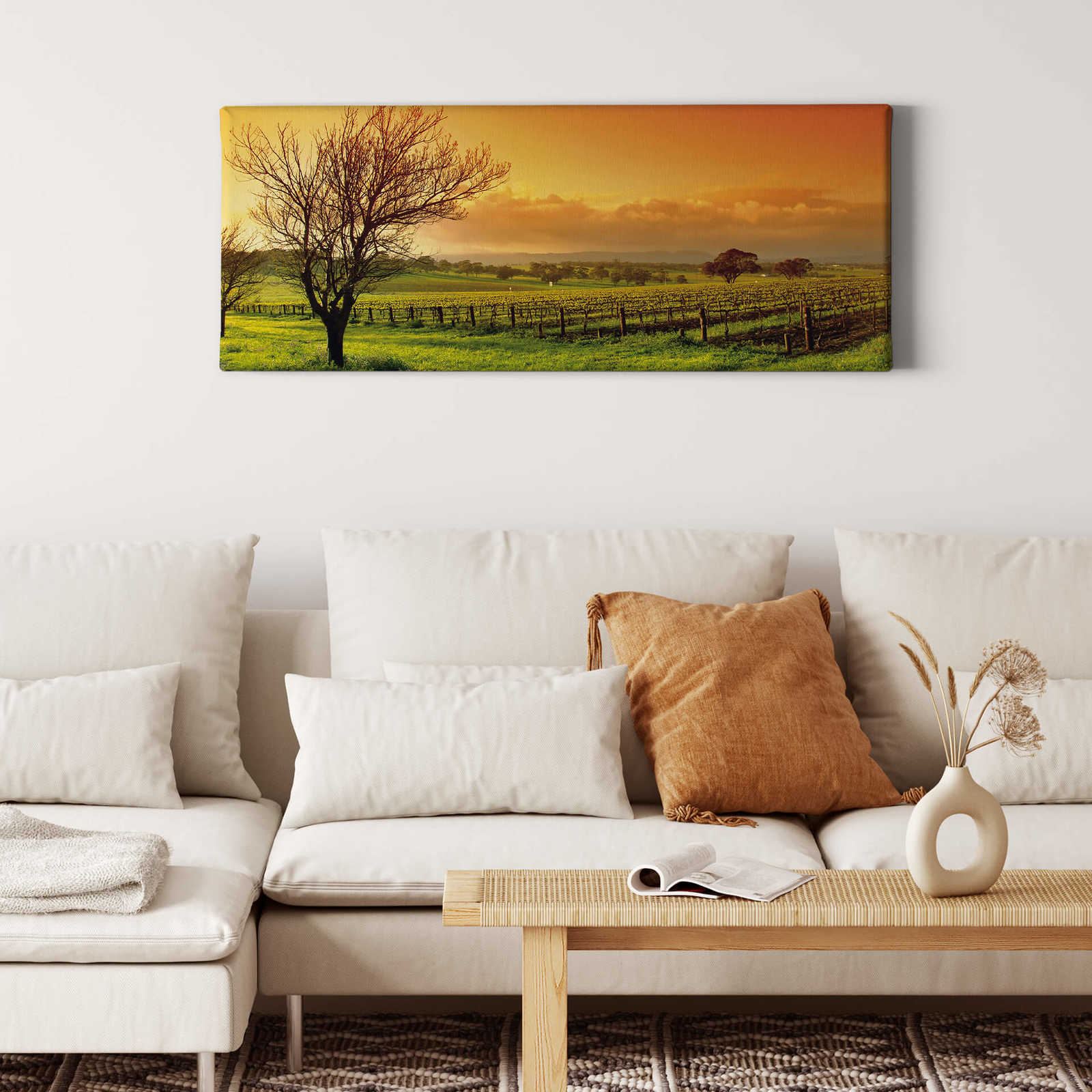             Canvas schilderij Wijngaarden bij zonsopgang - 1.00 m x 0.40 m
        