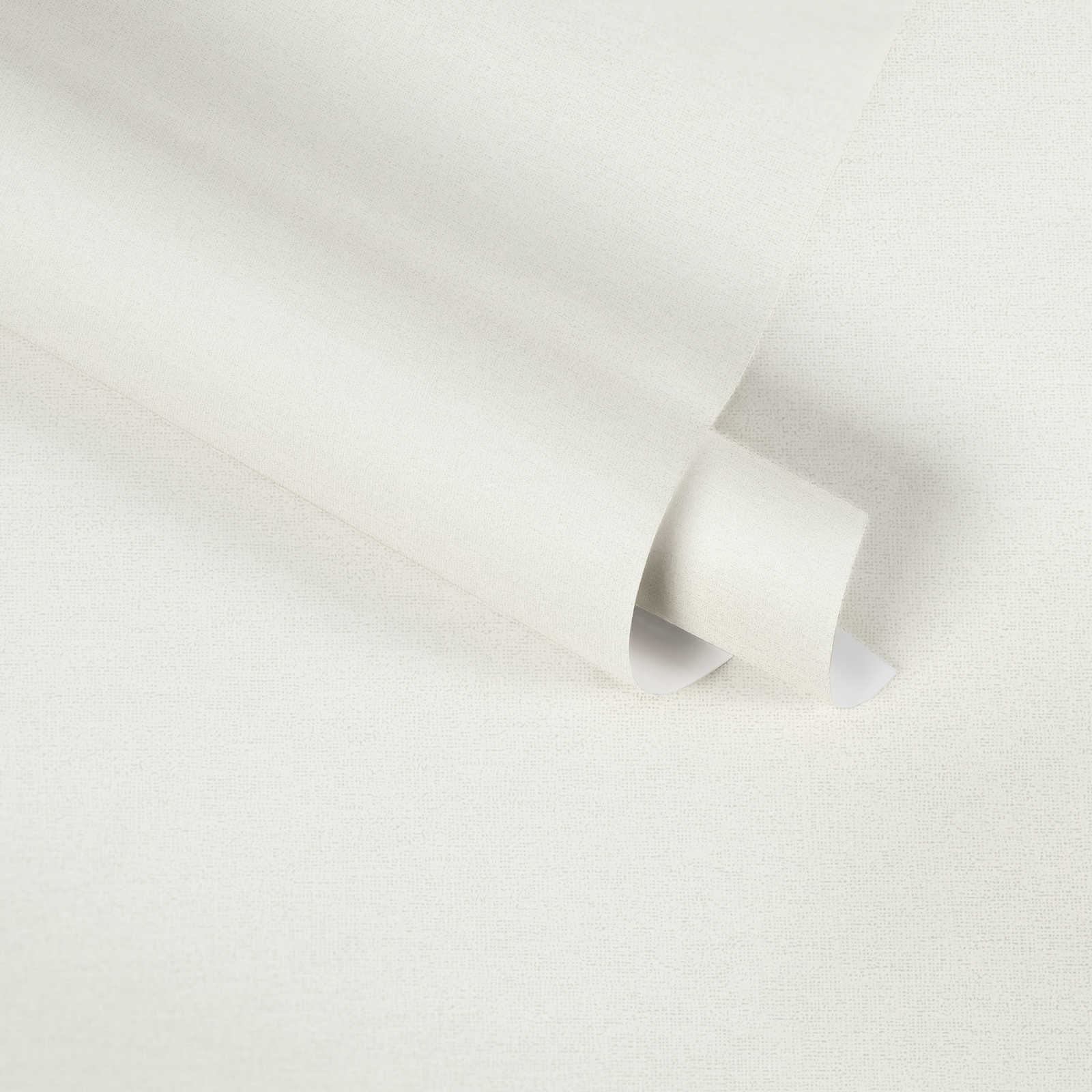             Plain wallpaper cream-white from MICHASLKY with textile structure
        