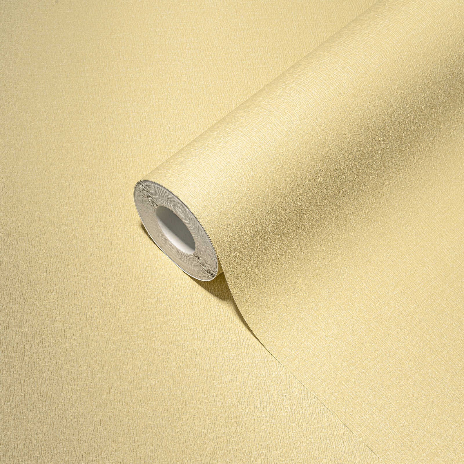             Plain non-woven wallpaper in a warm shade - yellow
        