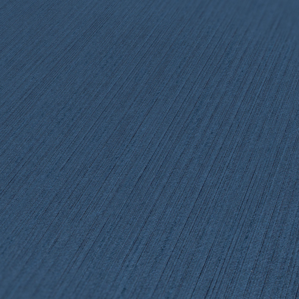             Effen vliesbehang met gelijnd structuurpatroon - blauw
        
