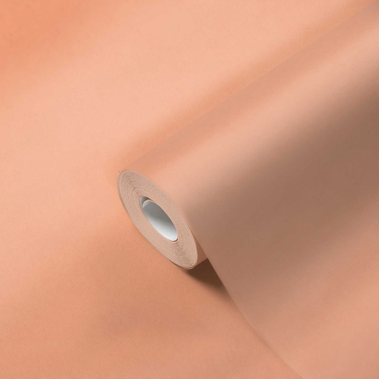             Non-woven wallpaper plain with light plaster pattern - orange
        