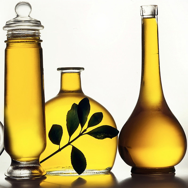 Fotomural Botellas con aceite de oliva - Nácar liso
