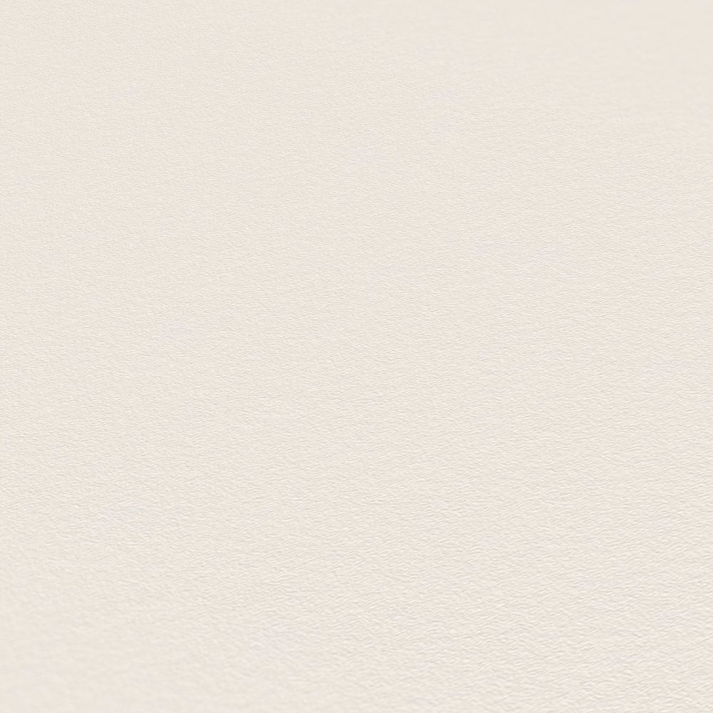             Papier peint crème uni avec structure peau d'éléphant
        