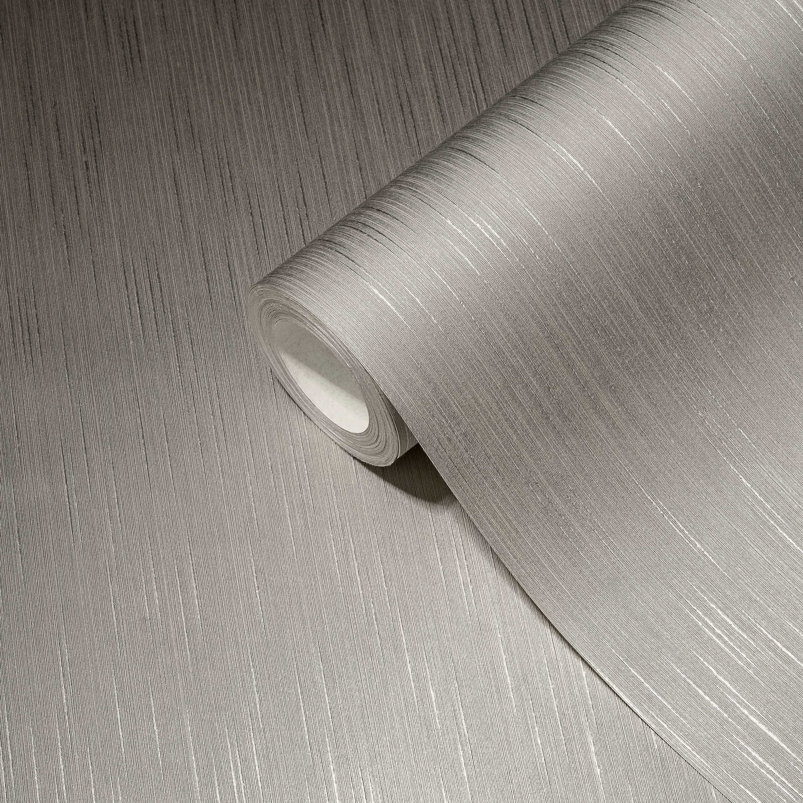             Papier peint gris avec effet textile chiné & finition satinée
        