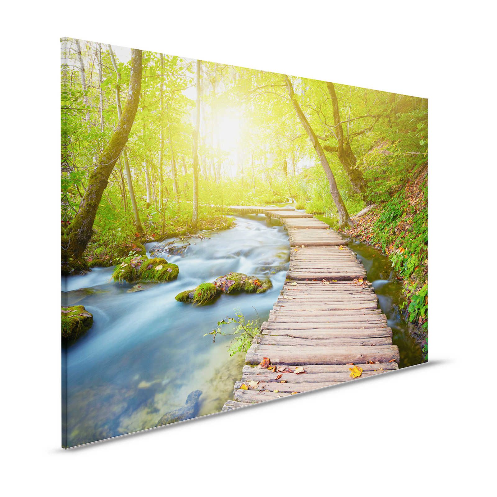 Canvas painting River with footbridge in the forest at sunrise - 1,20 m x 0,80 m
