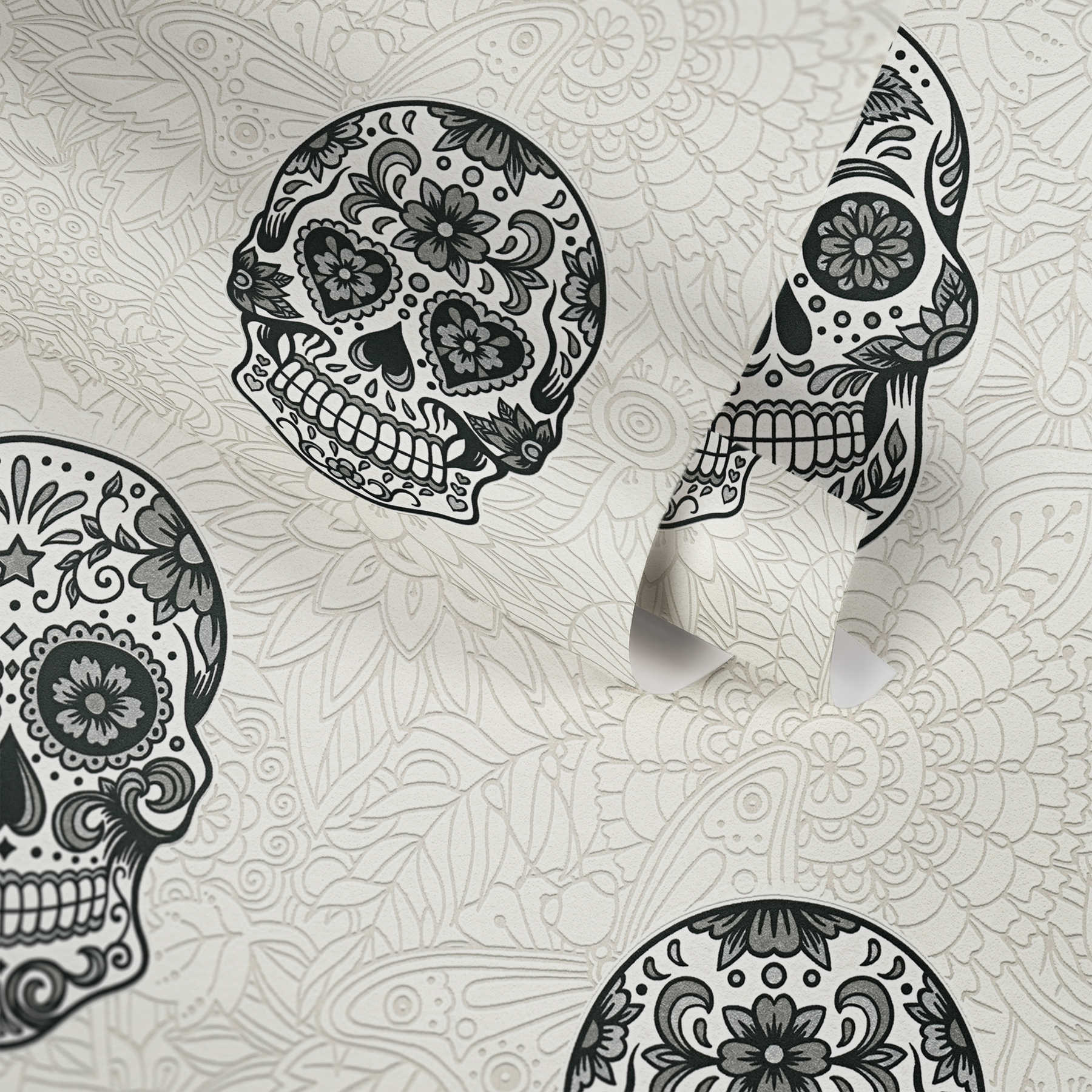             Papier peint tête de mort avec fleurs, décor Dia De Muertos - noir, blanc
        