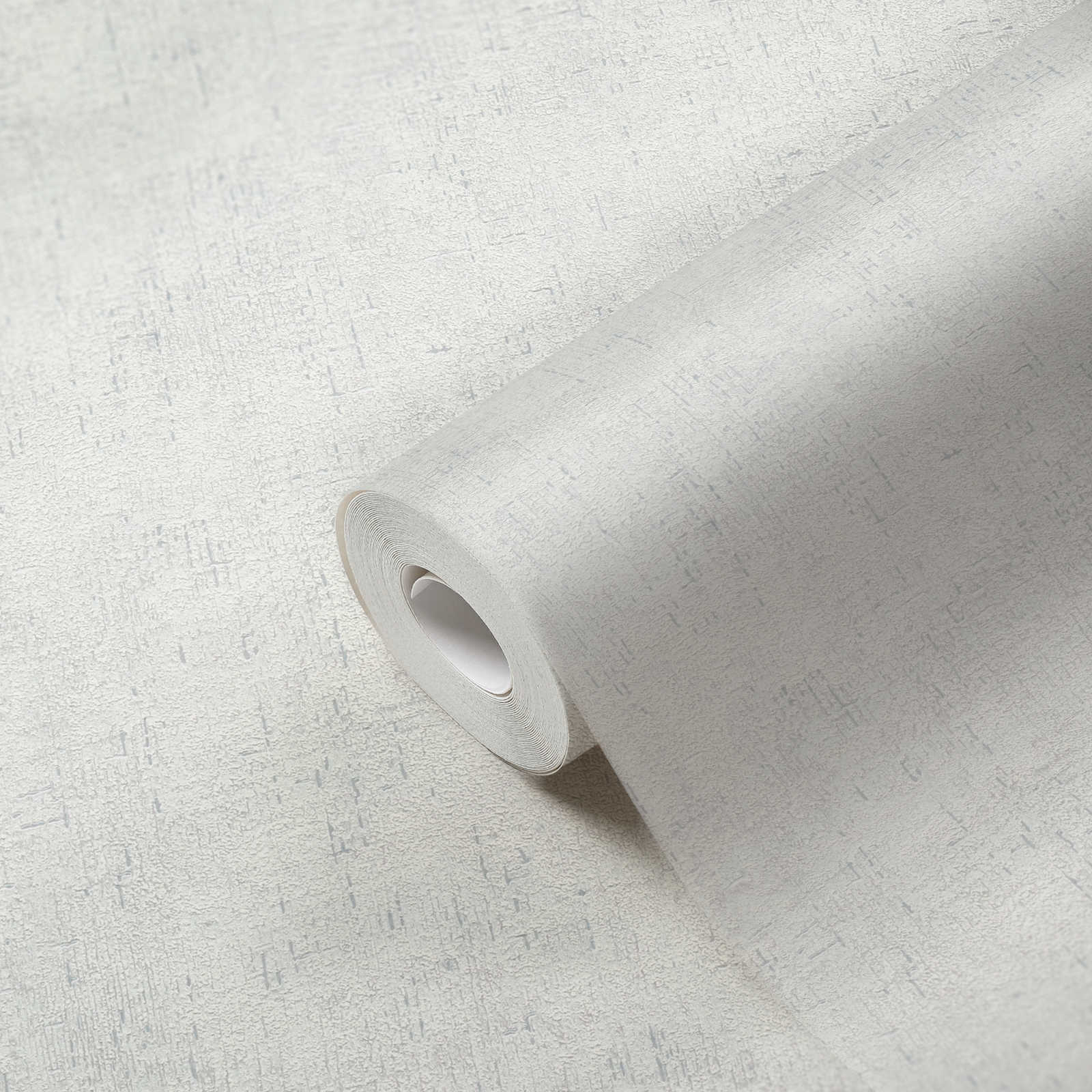             Papier peint intissé gris et blanc au design structuré rustique & effet mat-brillant
        