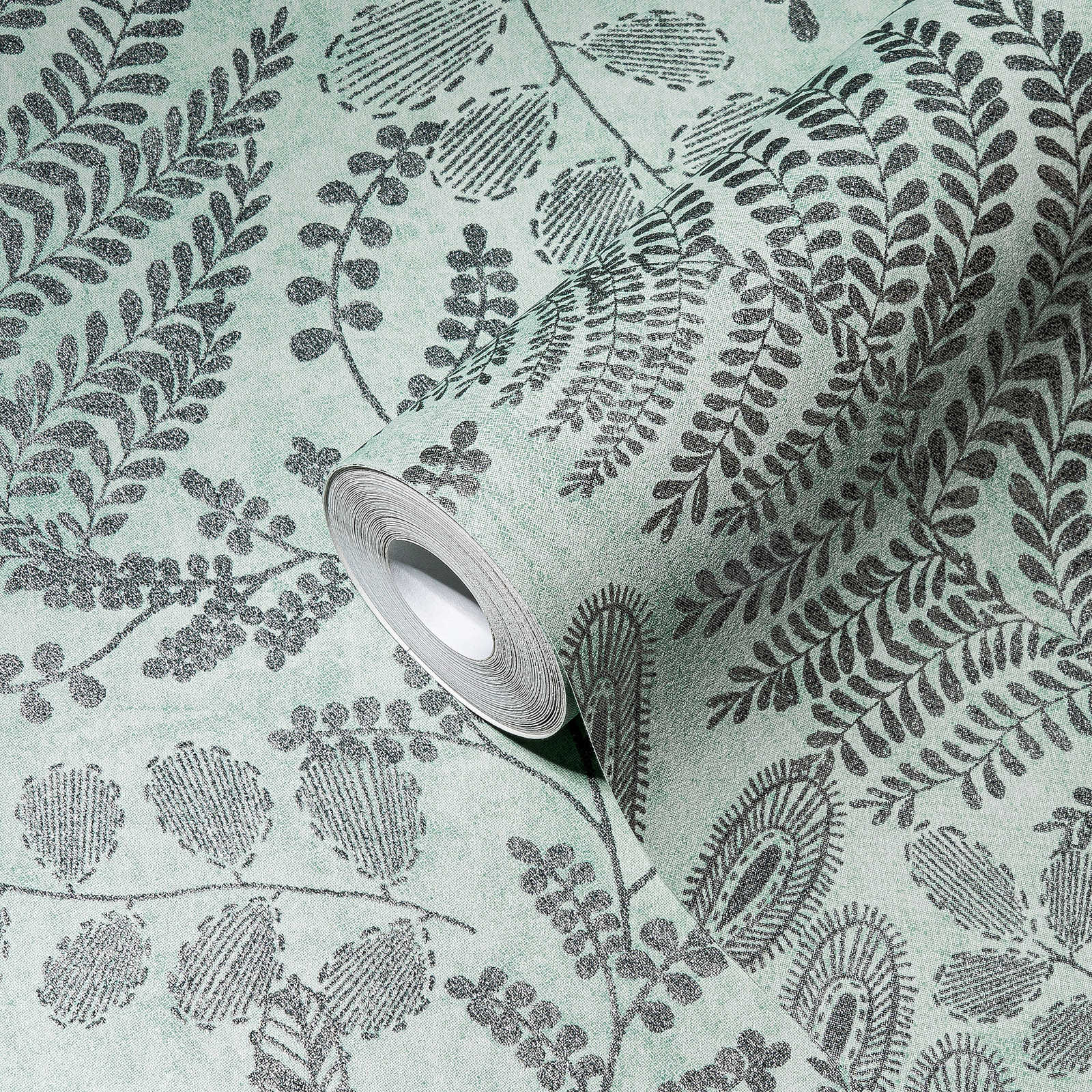            Skandi behang met bladmotief in metallic - blauw, groen
        