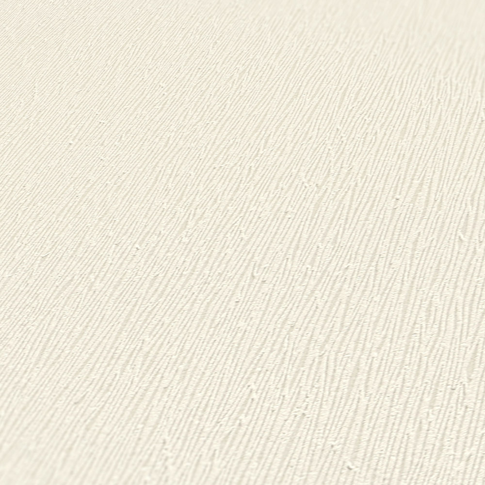             Papier peint uni crème avec motif structuré naturel
        