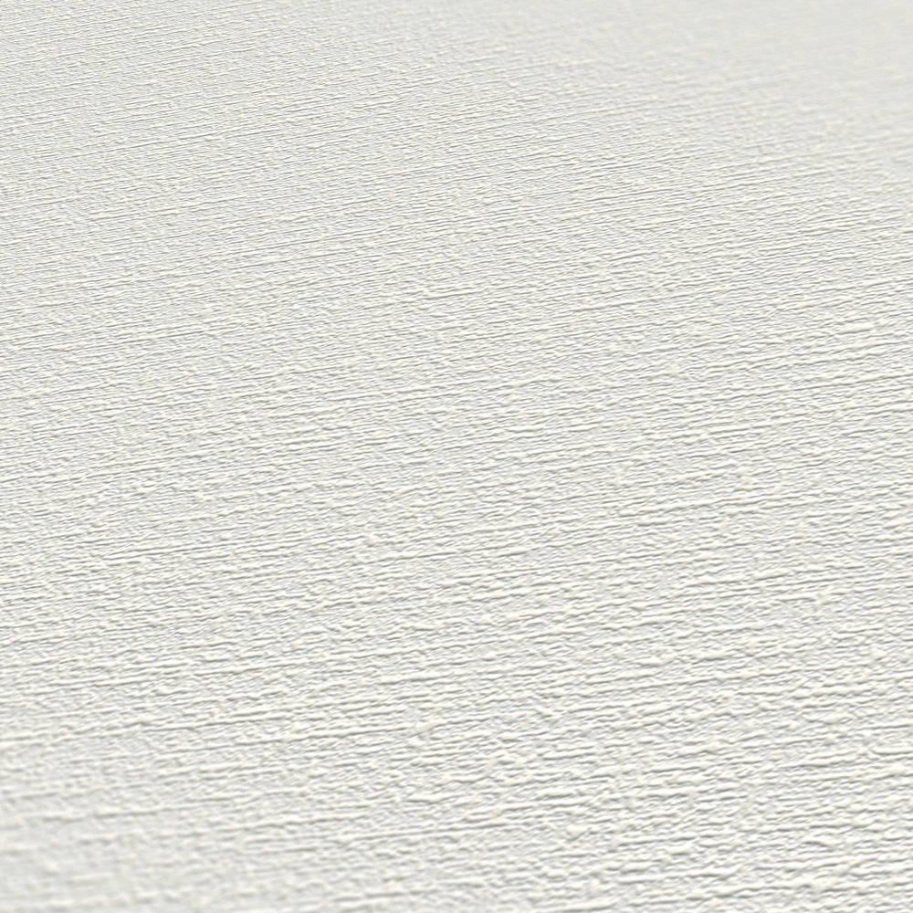             Papier peint intissé blanc uni avec motifs structurés
        