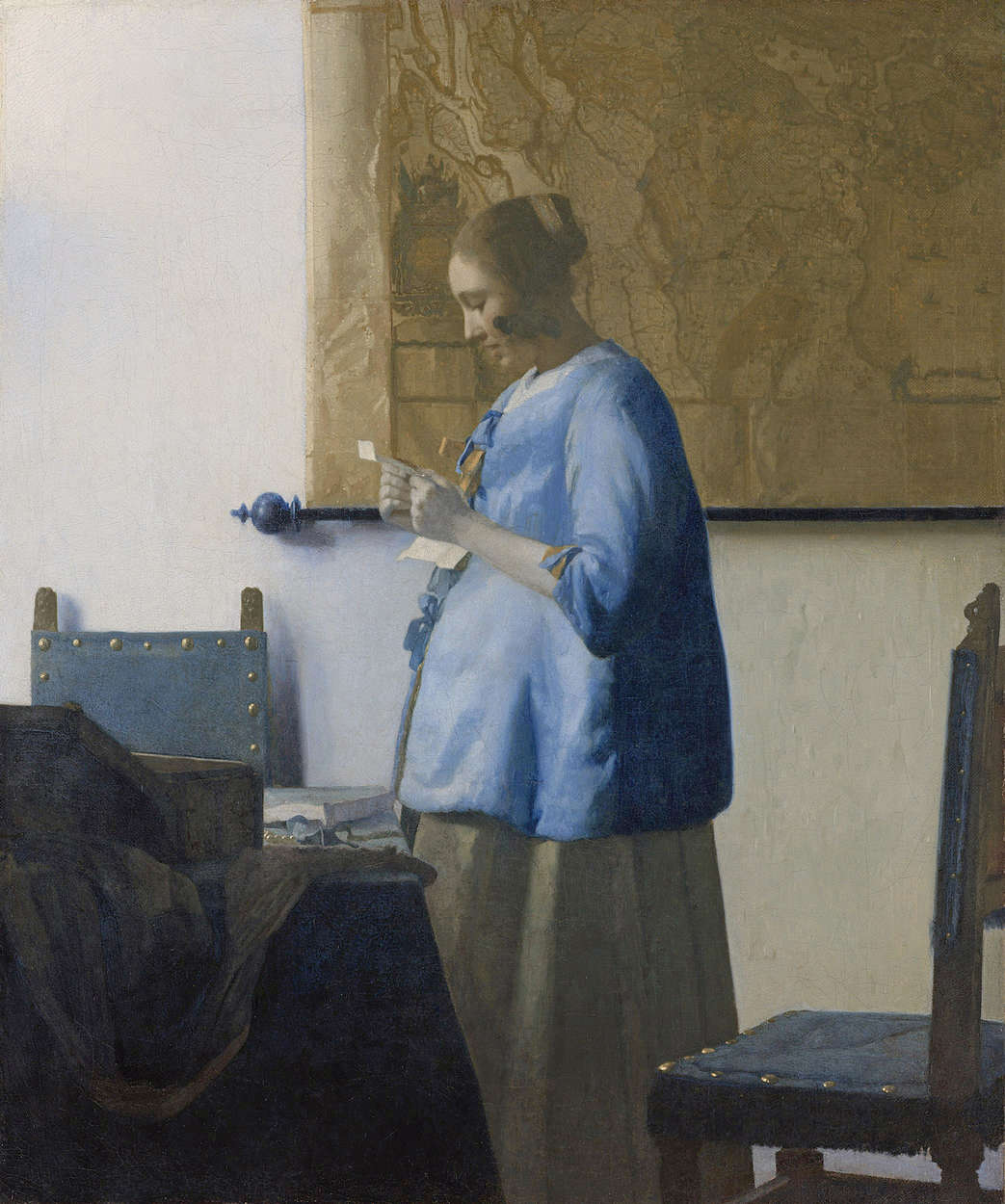             Mural "Mujer leyendo una carta" de Jan Vermeer
        