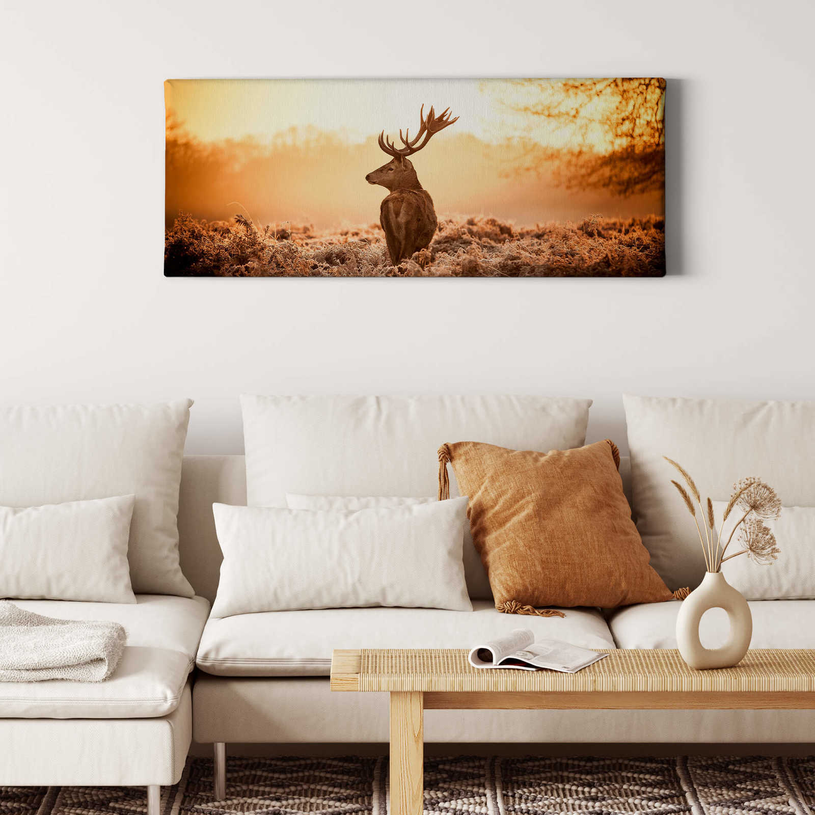             Panoramic canvas picture deer in sunlight – brown, orange
        
