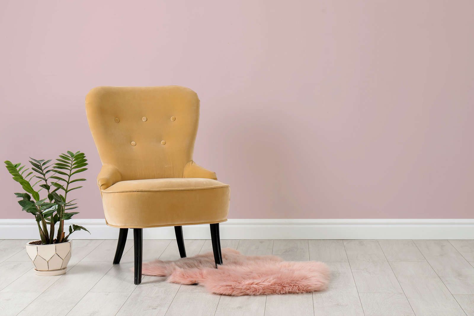 Room picture pink wall colour and yellow armchair