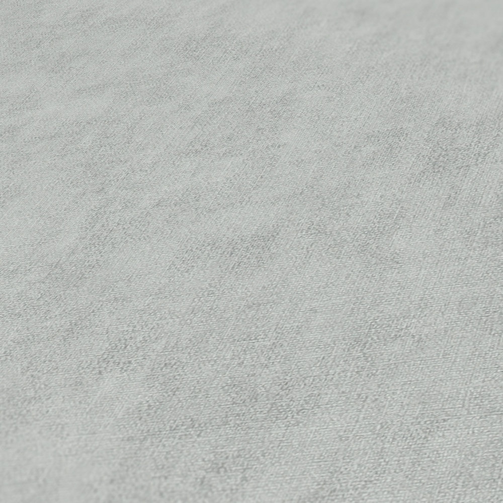             Papel pintado no tejido de aspecto de lino con un sutil dibujo - gris
        