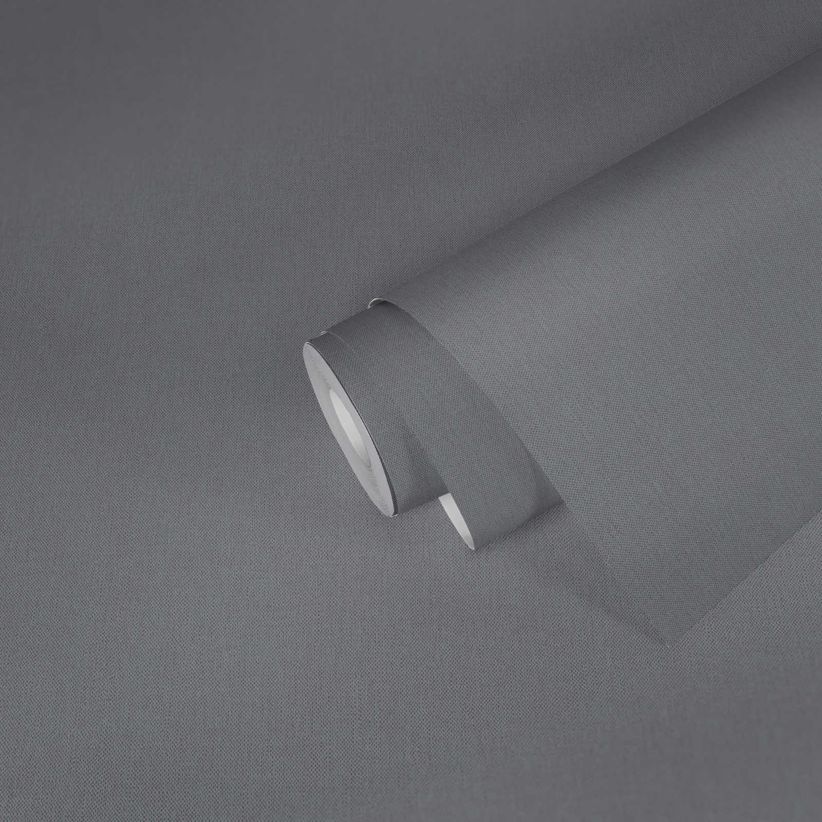             Papel pintado de aspecto de lino gris con estructura de tela y superficie mate
        