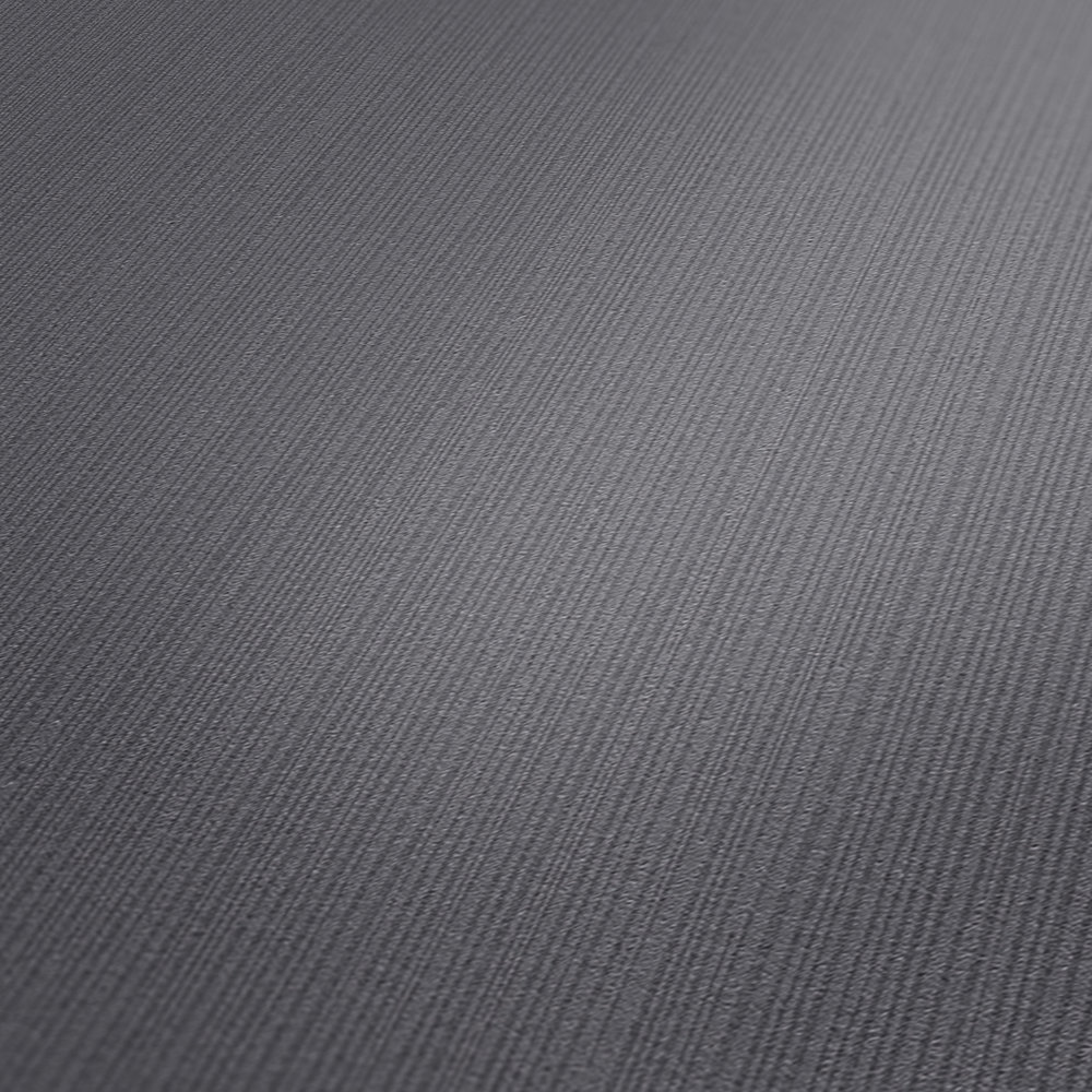             Non-woven wallpaper steel grey plain with texture effect
        