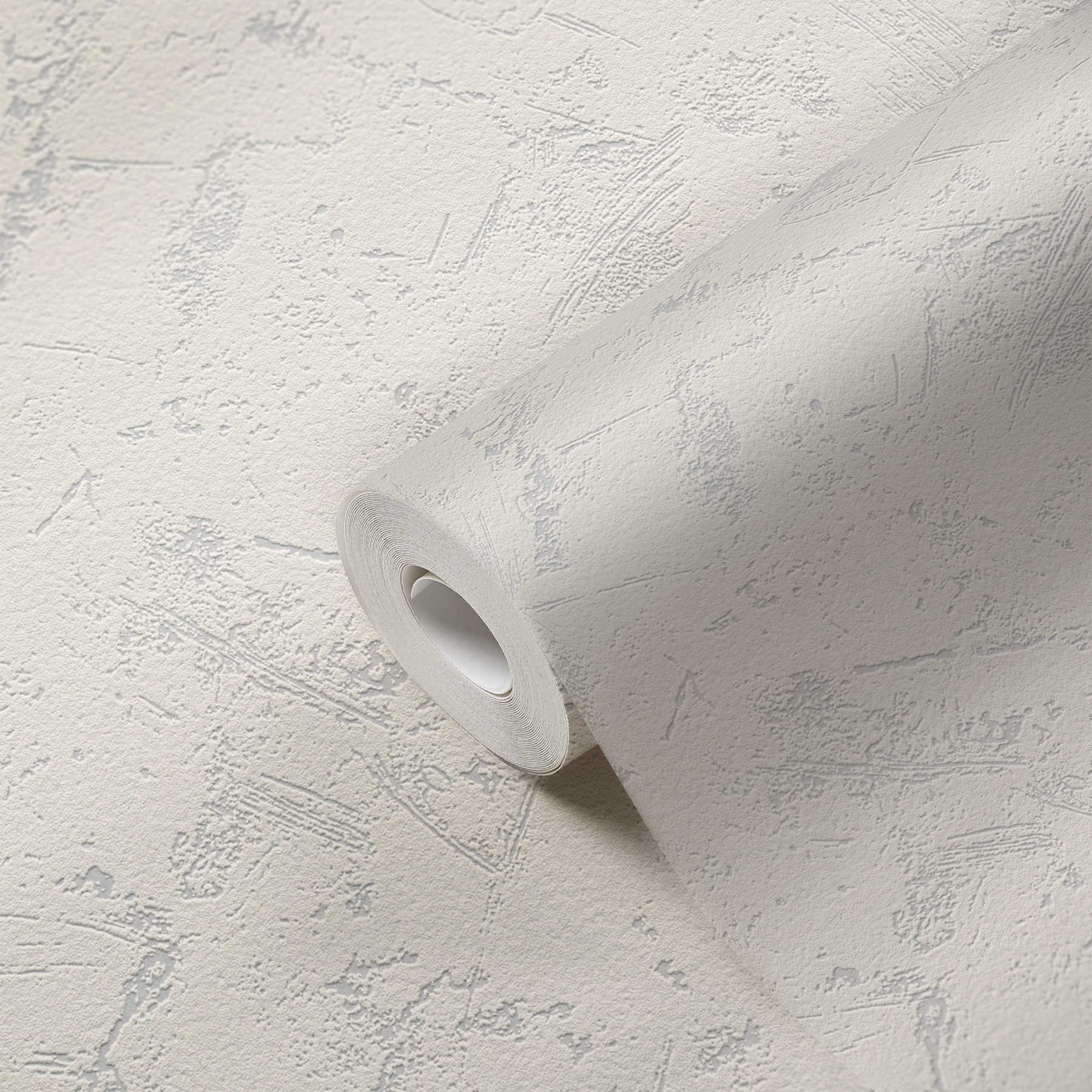             Paintable plaster look wallpaper with foam structure
        